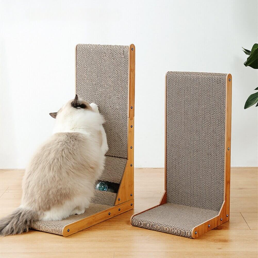 2 pieces Cat Scratching L-Board on which a white-grey cat scratches